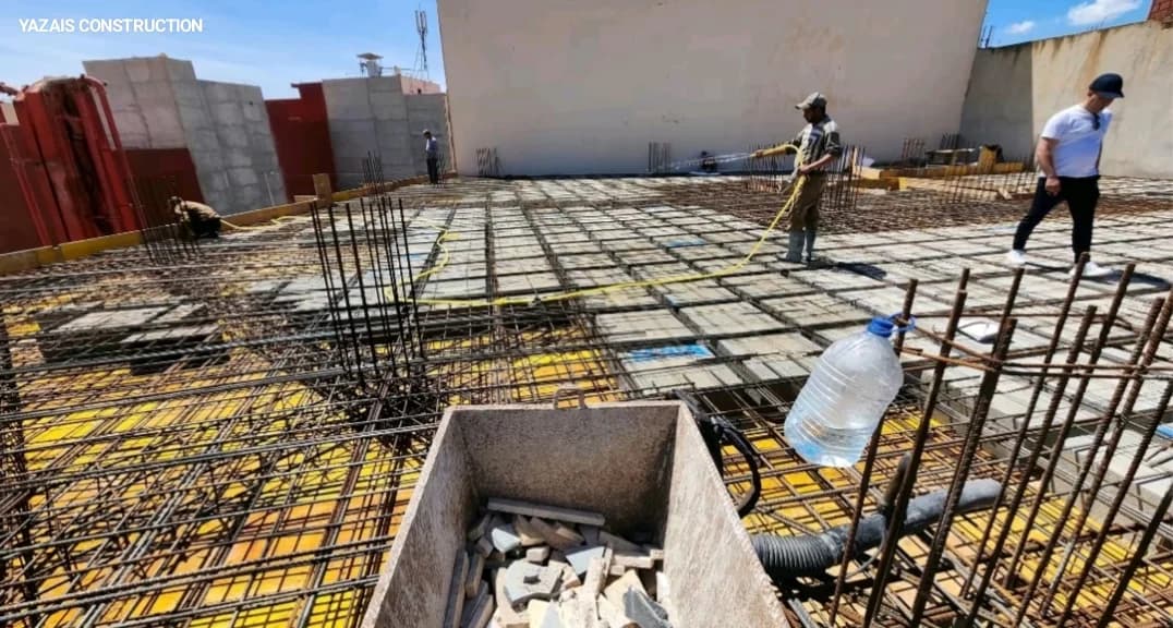Immeuble résidentiel R+3 avec planchers réticulés et radier général