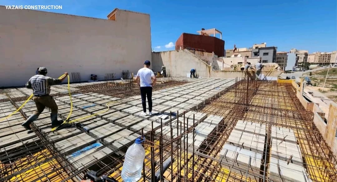 Immeuble résidentiel R+3 avec planchers réticulés et radier général