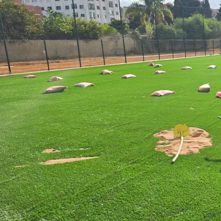 Amenagement de terrain de minifoot